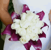 white rose bouquet with anthurium collar