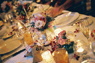 wedding reception floral centerpieces and votive candles